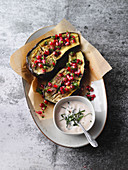 Baked aubergines with pomegranate and a mint soya dip