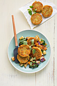 Vegan quinoa fritters with vegetable ragout
