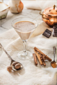 A chocolate martini with cinnamon and nutmeg
