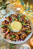 Cranberry marmalade Puff Pastry wreath with fondant Camembert