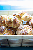 Poppy seed bread rolls in a bread basket