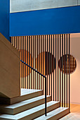 Patterns of geometric shapes and colours in hallway and stairwell