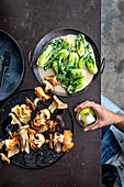 Grilled Asian mushrooms with coconut pak choi