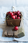 Cherries in a wooden basket