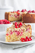 Juicy almond and redcurrant crumble cake