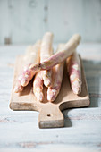 White asparagus on a wooden board