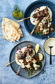 Lebanese skewers with charred cauliflower and lentil salad