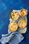 Creamy chicken artichoke and pesto pot pies