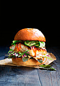 A miso fish burger with vegetables