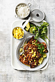 Jerk chicken with pineapple and coconut salsa