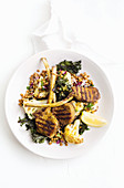 Indian lamb cutlets with lentil, kale and cauliflower salad