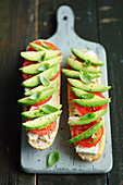 Rolls with feta, tomatoes and avocado