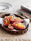 Spicy pinwheels made of ham, cream cheese and peppers