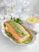 Poached salmon with cucumber slices and mango mayonnaise (Christmas)