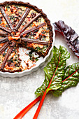 Chard and salmon quiche with a pumpernickel base
