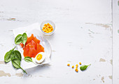 Smoked salmon, baby spinach, corn and a hard-boiled egg