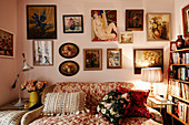 Gallery of pictures above sofa in granny-chic living room