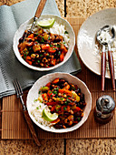 Vegetable chili with rice and limes