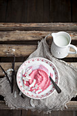 Cranberry porridge with coconut and milk