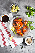 Spicy chicken wings with honey and sriracha