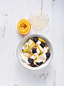 Orange rice pudding with fruit and walnuts