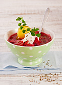 Borscht with sour cream and caraway seeds