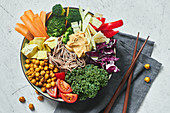 A Buddha bowl with soba noodles and crunchy chickpeas