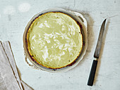 Creamy, tart matcha cheesecake with a biscuit base