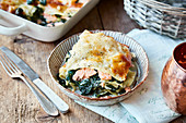 Spinach and salmon lasagne with a parmesan crust