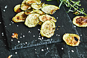 Courgette crisps with basil and rosemary