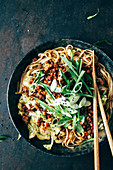 Noodles with minced meat, Chinese cabbage, spring onions and black sesame seeds (Korea)