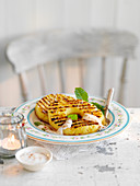 Grilled pineapple with spiced rum cinnamon cream