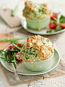Herbed asparagus souffles with spring onions