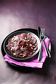Beetroot carpaccio with pine nuts