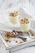 Pistachio panna cotta topped with oatmeal crumble