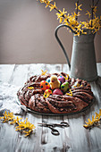 Yeast dough wreath filled with chocolate spread for Easter
