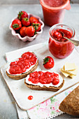 Open face sandwiches with strawberry jam and cream cheese