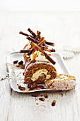 Cheesecake swiss roll with gingerbread sticks