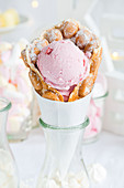 A bubble waffle with strawberry ice cream