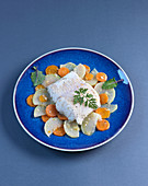 Steamed hake with carrots