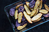 Oven-roasted potatoes in a glass dish