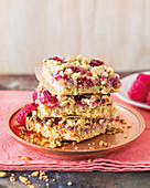 Raspberry and oatmeal slices, stacked