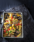 Tray-bake pasta with garlicky mushrooms and tomatoes