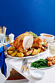 Roast turkey with bacon and herb stuffing