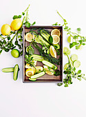 Lemons, limes, cucumber and herbs