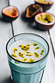 Passion fruit smoothie with banana, natural yoghurt and honey