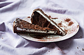 Rum cake with marzipan cream and a chocolate glaze
