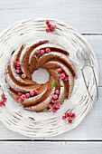 A wreath cake with redcurrants (seen from above)
