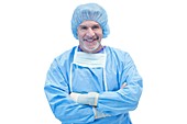 Male surgeon smiling towards camera