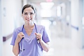 Nurse wearing purple uniform